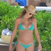 Exclusif - Stacy Keibler enceinte et son mari Jared Pobre se relaxent sur une plage à Cancun au Mexique, le 26 mai 2014.