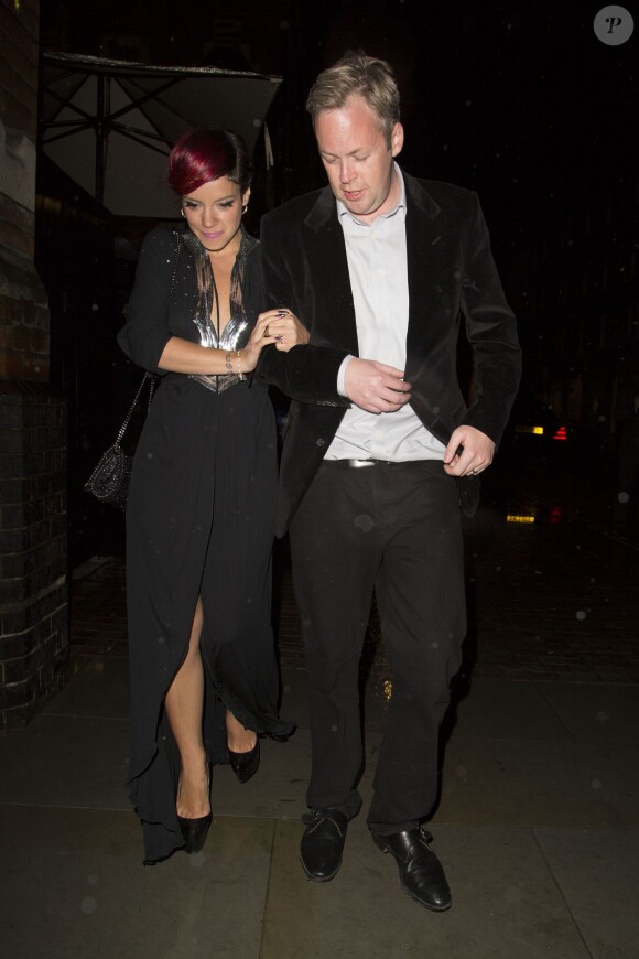 Lily Allen se rend à l'hôtel Chiltern Firehouse avec son mari Sam Cooper après avoir chanté lors de la soirée "The Other Ball" à Londres, le 4 juin 2014.