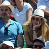 Clovis Cornillac et sa femme Lilou Fogli aux Internationaux de France de tennis de Roland Garros à Paris, le 6 juin 2014