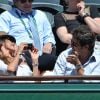 Patrick Bruel et sa compagne Caroline aux Internationaux de France de tennis de Roland Garros à Paris, le 6 juin 2014