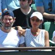Jalil Lespert et sa compagne Sonia Rolland aux Internationaux de France de tennis de Roland Garros à Paris, le 6 juin 2014