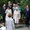 Le prince Philip, duc d'Edimbourg, Anne Hidalgo, la reine Elizabeth II d'Angleterre, François Hollande à l'occasion d'une visite du marché aux fleurs - qui porte le nom Elizabeth II - à Paris le 7 juin 2014.