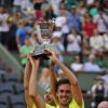 Julien Benneteau et Edouard Roger-Vasselin ont décroché le titre en double lors des Internationaux de France à Paris à Roland-Garros, le 7 juin 2014 face à  Marcel Granollers et Marc Lopez