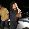 Rihanna arrive au restaurant Giorgio Baldi, tout de noir vêtue avec un haut Valentino, un jean Hudson, des souliers Christian Louboutin (modèle So Kate) et un sac Louis Vuitton (modèle Alma BB). Santa Monica, le 8 juin 2014.