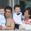 Coleen Rooney, sa mère et ses enfants Klay et Kai au Grand National de Liverpool, le 5 avril 2014