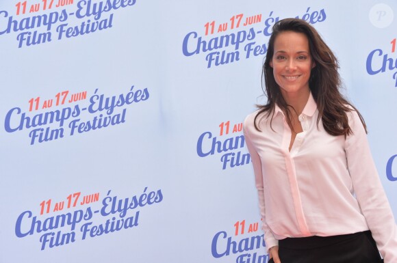 Karine Lima lors du photocall de la cérémonie de clôture du 3e Champs-Elysées Film Festival au Publicis à Paris, le 17 juin 2014