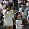 Marion Bartoli n'a pu retenir ses pleurs lors de son retour à Wimbledon, lors d'une petite cérémonie qui lui rendait hommage, ainsi qu'à Elena Baltacha, la joueuse britannique décédée le 4 mai, au All England Lawn Tennis and Croquet Club de Wimbledon, le 24 juin 2014