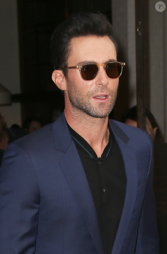 Adam Levine sort d'un building à New York, le 23 juin 2014.