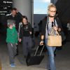 Russell Crowe, son ex-femme Danielle Spencer et leurs fils Charles et Tennyson arrivent à Los Angeles, le 26 juin 2014.