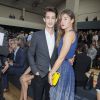 Pierre Niney et Natasha Andrews - Défilé Dior Homme printemps-été 2015 au Tennis Club de Paris, le 28 juin 2014.