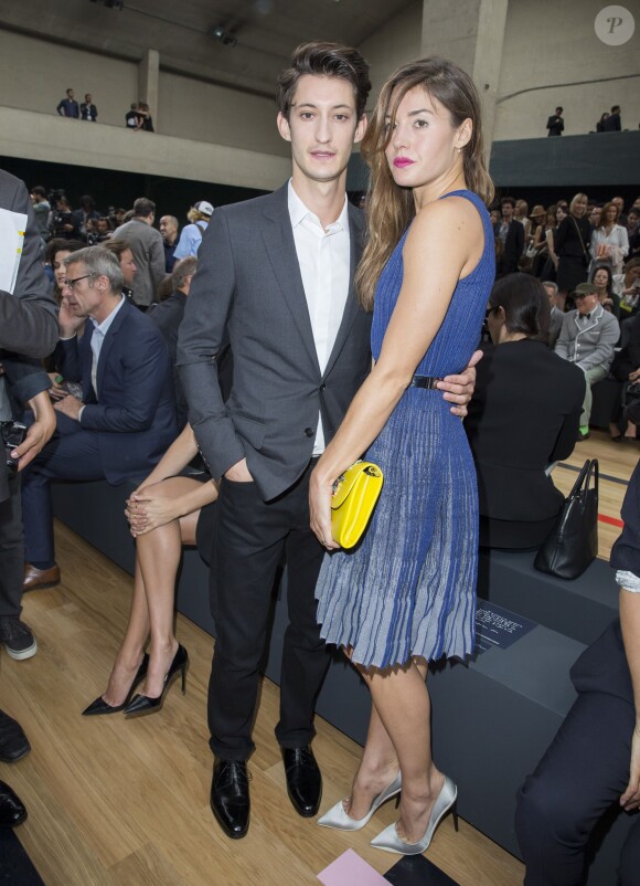 Pierre Niney et Natasha Andrews - Défilé Dior Homme printemps-été 2015 au Tennis Club de Paris, le 28 juin 2014.