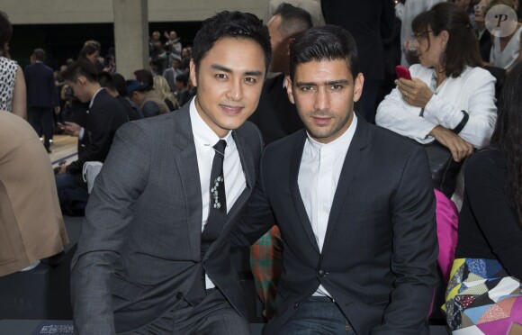 Ming Dao et Salim Kechiouche - Défilé Dior Homme printemps-été 2015 au Tennis Club de Paris, le 28 juin 2014.
