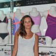Laure Manoudou présente sa collection de maillots de bain 'Laure Manaoudou Design' lors d'un défilé à la Piscine de Boulogne-Billancourt le 2 Juillet 2014.