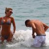 Steven Gerrard découvre que son maillot est transparent sous les yeux de sa superbe épouse Alex à Ibiza, le 3 juillet 2014