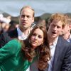 Kate Middleton, très impatiente, et les princes William et Harry à l'arrivée de la première étape du Tour de France à Harrogate, en Angleterre, le 5 Juillet 2014.