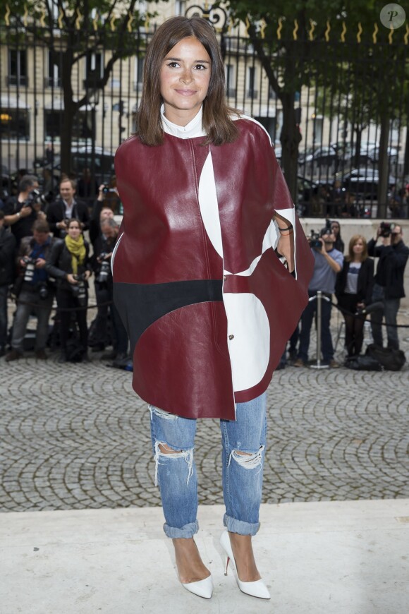 Miroslava Duma arrive au Salon de la chambre de commerce et d'industrie pour assister au défilé haute couture Versace automne-hiver 2014-2015. Paris, le 6 juillet 2014.