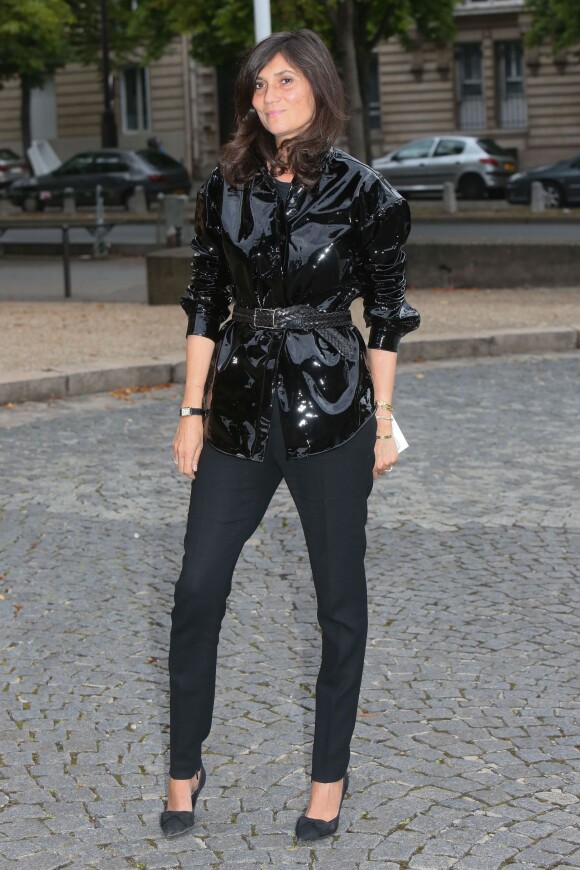 Emmanuelle Alt arrive au Palais d'Iéna pour assister au défilé Miu Miu croisière 2015. Paris, le 5 juillet 2014.