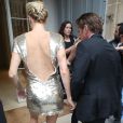Sean Penn et sa compagne Charlize Theron sortent du showroom Christian Dior à Paris, le 7 juillet 2014.