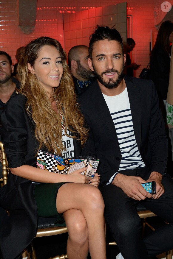 Nabilla Benattia et son amoureux Thomas Vergara assistent au défilé Jean-Paul Gaultier à Paris le 9 juillet 2014
