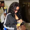 Rihanna arrive à l'aéroport de Galeao à Rio de Janeiro au Brésil, le 11 juillet 2014.