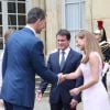 Le roi Felipe VI et la reine Letizia d'Espagne ont été reçus le 22 juillet 2014 à Matignon par Manuel Valls et sa femme Anne Gravoin, dans le cadre de leur visite inaugurale en France.