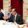 Le roi Felipe VI et la reine Letizia d'Espagne ont été reçus en audience et à déjeuner à l'Elysée par le président François Hollande, le 22 juillet 2014 à Paris, pour leur visite inaugurale en France.