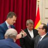 Le roi Felipe VI et la reine Letizia d'Espagne ont été reçus en audience et à déjeuner à l'Elysée par le président François Hollande, le 22 juillet 2014 à Paris, pour leur visite inaugurale en France.