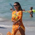 Ludivine Sagna sur une plage de Miami durant leurs vancances, le 23 juillet 2014