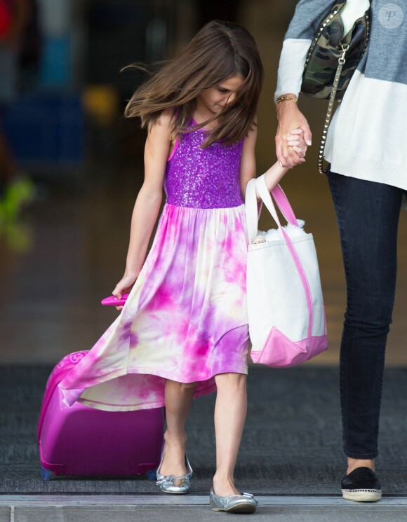 Katie Holmes et sa fille Suri arrivent à New York, le 23 juillet 2014.