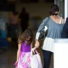 Katie Holmes et sa fille Suri arrivent à New York en provenance de Los Angeles, le 23 juillet 2014.