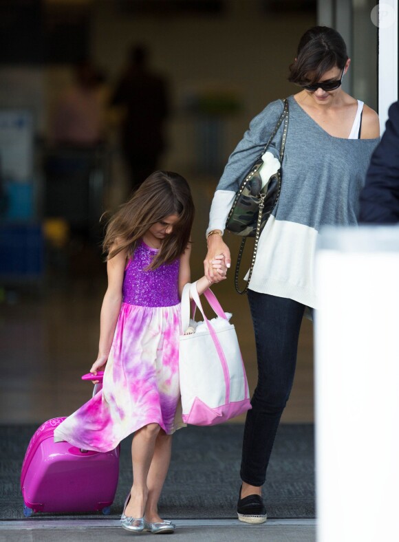 Katie Holmes et sa fille Suri arrivent à New York en provenance de Los Angeles, le 23 juillet 2014.