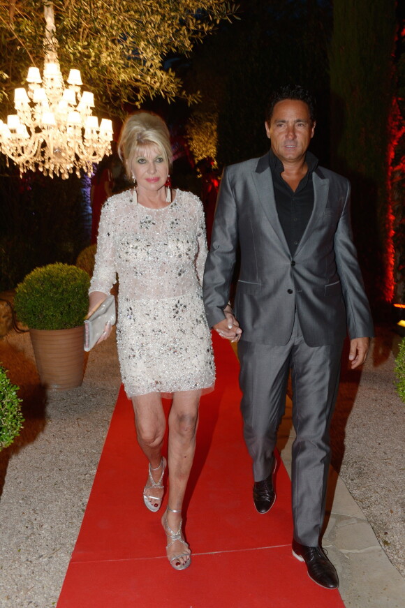 Exclu - Ivana Trump et son fiancé Marcantonio Rota, lors de la grande fête organisée pour l'anniversaire de Monika Bacardi à Saint-Tropez, le 27 juillet 2014.