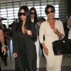 Kris Jenner et ses filles Kim Kardashian et Kendall Jenner à l'aéroport de Los Angeles pour prendre un vol, le 31 juillet 2014.