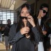 Kris Jenner et ses filles Kim Kardashian et Kendall Jenner à l'aéroport de Los Angeles pour prendre un vol, le 31 juillet 2014.