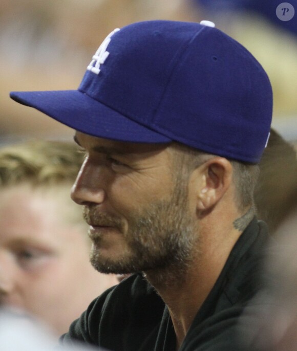 David Beckham assiste au match de baseball des Los Angeles Dodgers au Dodger Stadium. Los Angeles, le 1er août 2014.