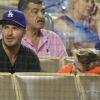 David Beckham et son fils Cruz assistent au match de baseball des Los Angeles Dodgers au Dodger Stadium. Los Angeles, le 1er août 2014.