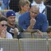David Beckham et ses fils Brooklyn, Cruz et Romeo assistent au match de baseball des Los Angeles Dodgers au Dodger Stadium. Los Angeles, le 1er août 2014.