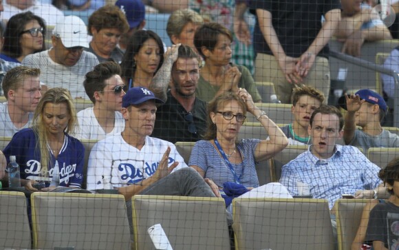 David Beckham et ses fils Brooklyn, Cruz et Romeo assistent à un match de baseball au Dodger Stadium. Los Angeles, le 1er août 2014.