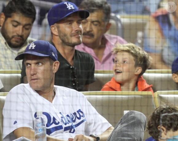 David Beckham et son fils Cruz assistent au match de baseball des Los Angeles Dodgers au Dodger Stadium. Los Angeles, le 1er août 2014.