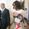 Un couple si complice ! Le 18 juillet 2014, Barack et Michelle Obama font leur arrivée à un dîner main dans la main, plus in love que jamais 