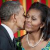 Barack et Michelle Obma partagent un baiser en public, en 2012