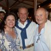Bertrand Delanoë en compagnie du maire de St-Tropez et de sa femme, au restaurant La Bouillabaisse à Saint-Tropez, à l'occasion d'un dîner organisé par Marcel Campion, le 6 août 2014.