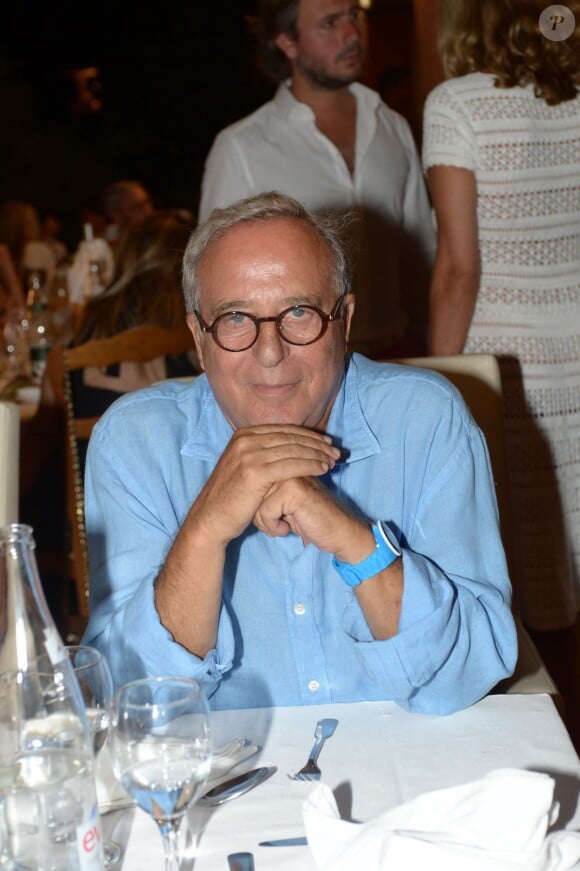 Daniel Hechter au restaurant La Bouillabaisse à Saint-Tropez, à l'occasion d'un dîner organisé par Marcel Campion, le 6 août 2014.