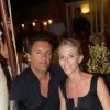 Danny Brillant et sa femme Nathalie au restaurant La Bouillabaisse à Saint-Tropez, à l'occasion d'un dîner organisé par Marcel Campion, le 6 août 2014.