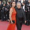 Christian Clavier et sa compagne Isabelle De Araujo lors de la première du film "The Immigrant" lors du 66e Festival du Film de Cannes, le 24 mai 2014
