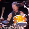 Joey Kramer d'Aerosmith en concert en 2003