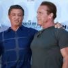 Sylvester Stallone and Arnold Schwarzenegger lors du photocall d'Expendables 3 à Cannes le 18 mai 2014