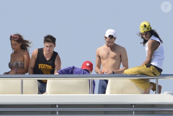 Zac Efron et Michelle Rodriguez sur un yacht à Ibiza, le 2 août 2014.