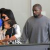 Kim Kardashian, Kanye et North West prennent un vol à l'aéroport de Los Angeles. Le 1er septembre 2014.