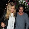 Chelsy Davy et son boyfriend Charles Goode, bien bronzés après leurs vacances en Afrique, à l'inauguration de la boutique Baar and Bass sur Kings Road, à Londres, le 9 septembre 2014.